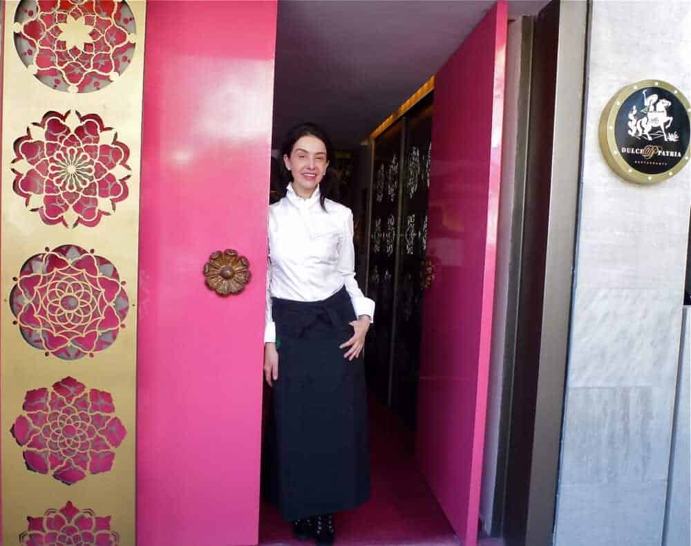 Chef Martha Ortiz in the doorway at Dulce Patria restaurant. 