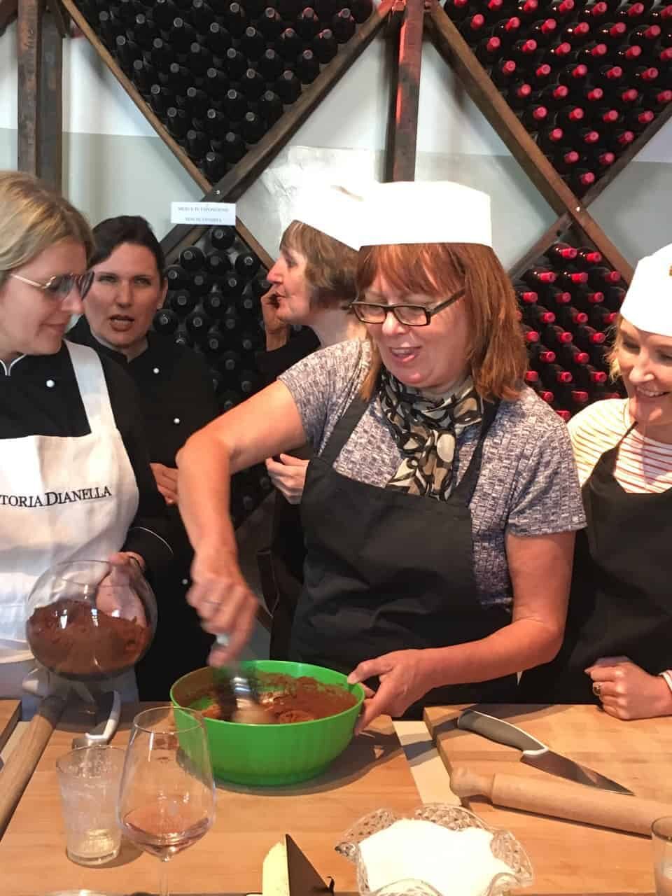 Women in a cooking class in Italy.