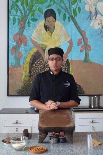 A male chef leading a chocolate class at Mucho Mundo Museum in Mexico City. 