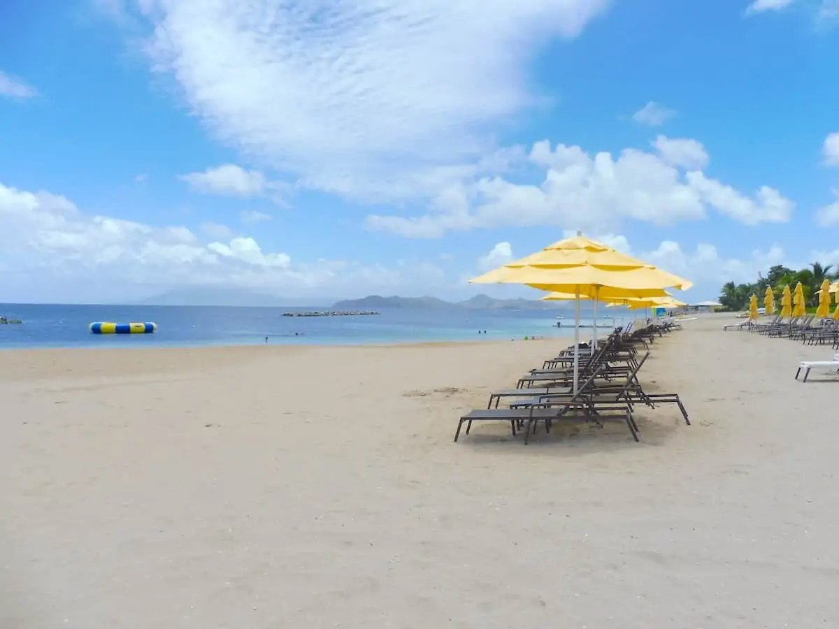 Loungers on Pinney's Beach in Nevis.