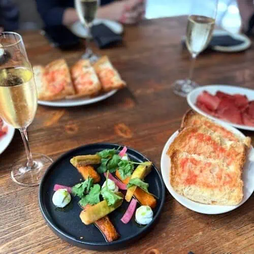 Catalan food in Barcelona on a wooden table.