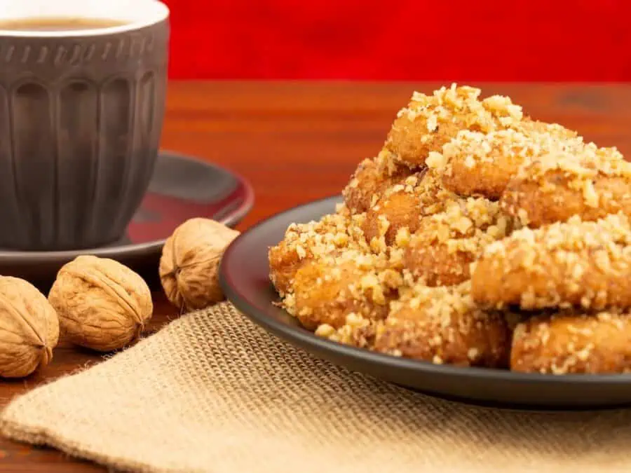 Melomakarona (honey cookies) on a plate at Christmas. 