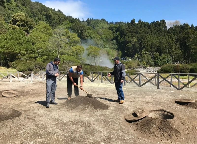 Locals prepare cozido, a meat and root vegetable cooked by volcanic heat in underground pits in Furnas, Azores