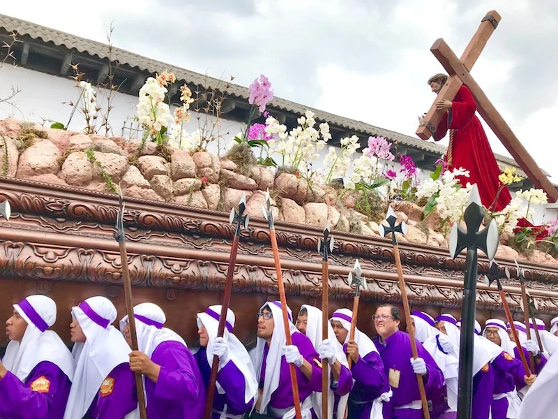 Men in robes in a Semana Santa procession in Antigua, Guatemala.